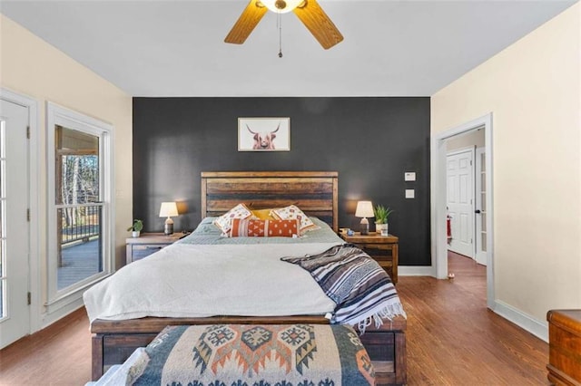 bedroom with ceiling fan and wood-type flooring