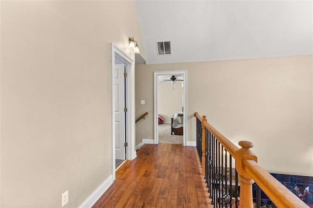 corridor featuring hardwood / wood-style flooring