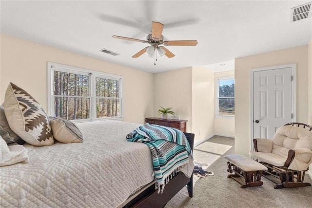 carpeted bedroom featuring ceiling fan