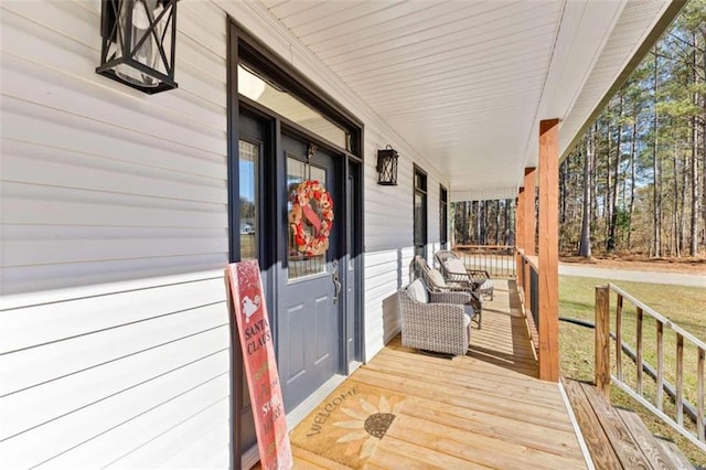 wooden deck featuring a porch