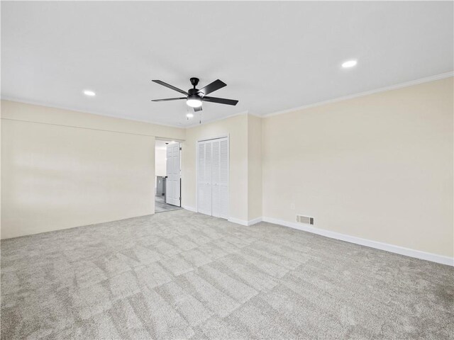 239 Brown Dr, Clermont, GA 30527 - carpeted spare room with visible vents, recessed lighting, ceiling fan, and ornamental molding