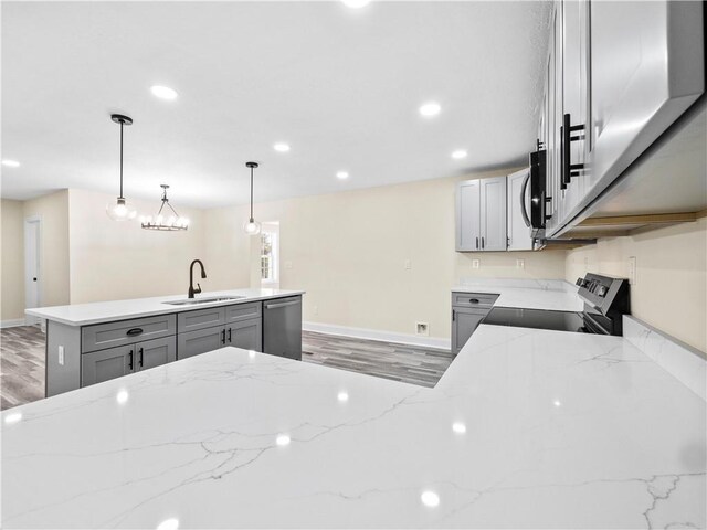 239 Brown Dr, Clermont, GA 30527 - kitchen featuring recessed lighting, appliances with stainless steel finishes, gray cabinetry, and a sink