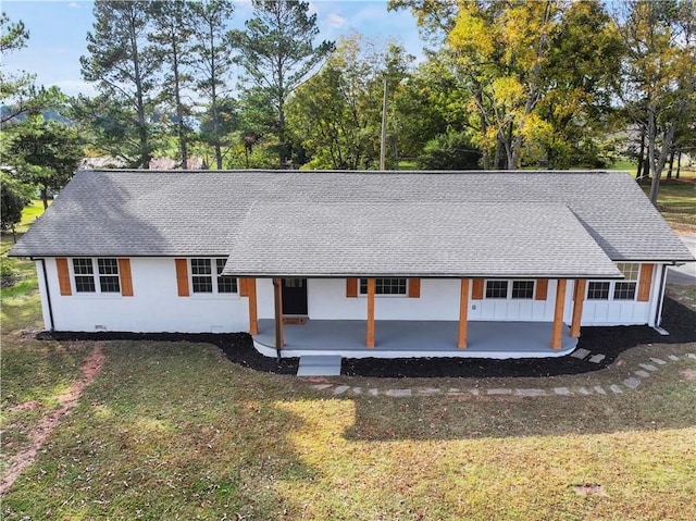 239 Brown Dr, Clermont, GA 30527 - view of front of house with a front lawn, a patio area, and roof with shingles