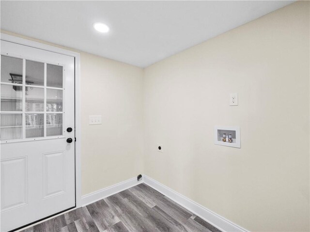 239 Brown Dr, Clermont, GA 30527 - laundry area featuring dark wood-style flooring, baseboards, hookup for an electric dryer, hookup for a washing machine, and laundry area