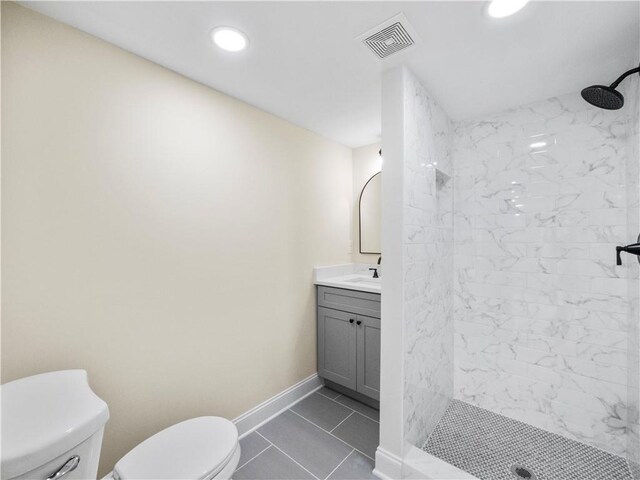 239 Brown Dr, Clermont, GA 30527 - full bath featuring visible vents, toilet, baseboards, tiled shower, and vanity