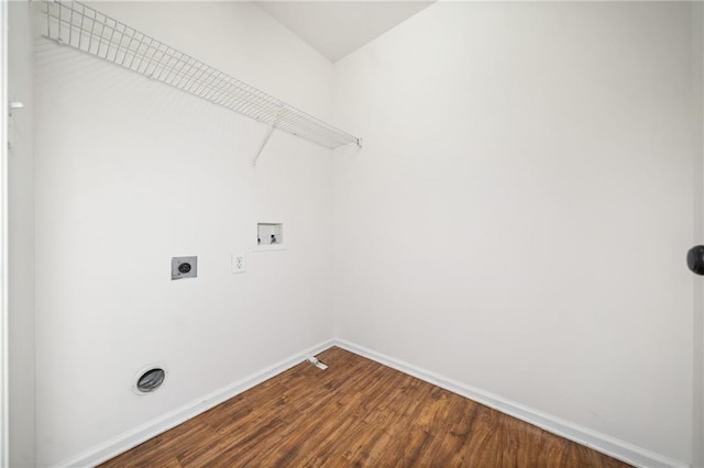 washroom with hardwood / wood-style floors, hookup for an electric dryer, and washer hookup