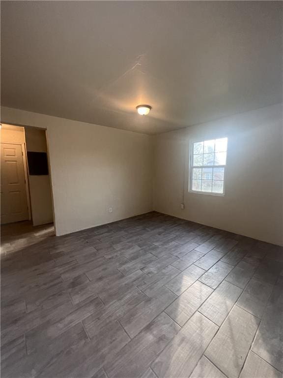 empty room featuring wood finish floors