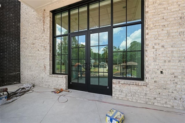 8200 Main St S Unit 1306, Woodstock, GA 30188 - doorway to property with french doors and brick siding