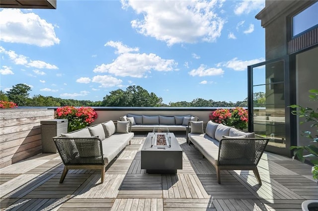 8200 Main St S Unit 1306, Woodstock, GA 30188 - wooden terrace with an outdoor living space with a fire pit