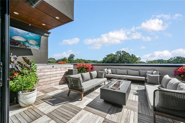 8200 Main St S Unit 1306, Woodstock, GA 30188 - wooden terrace featuring an outdoor living space with a fire pit
