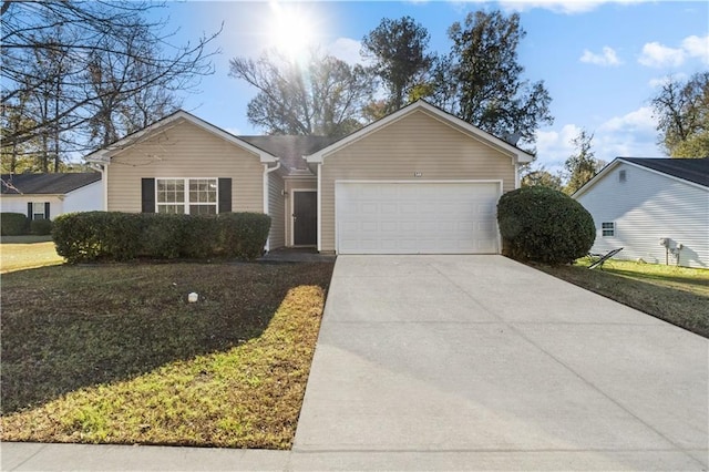 ranch-style home with a front lawn and a garage