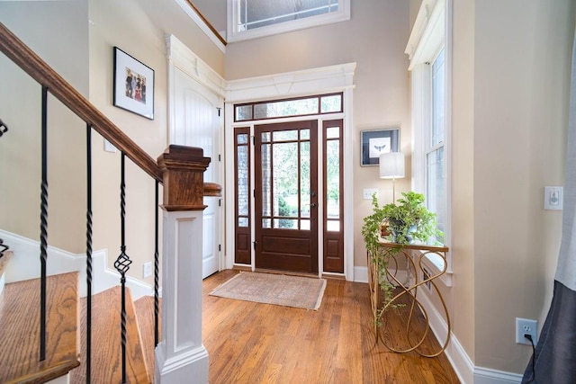 foyer with light hardwood / wood-style floors