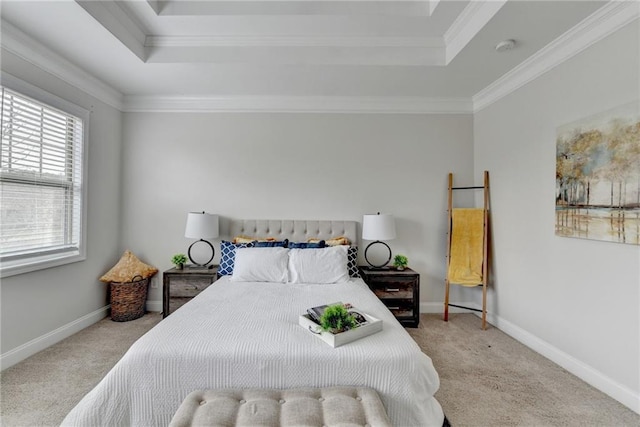 carpeted bedroom featuring a raised ceiling, crown molding, and baseboards