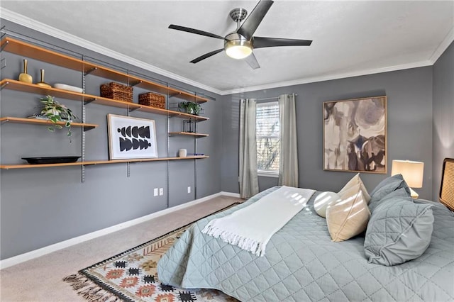 bedroom featuring carpet, ceiling fan, and ornamental molding