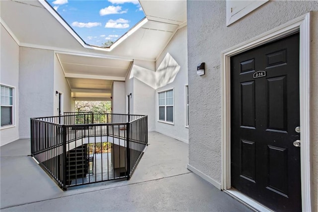 doorway to property with covered porch