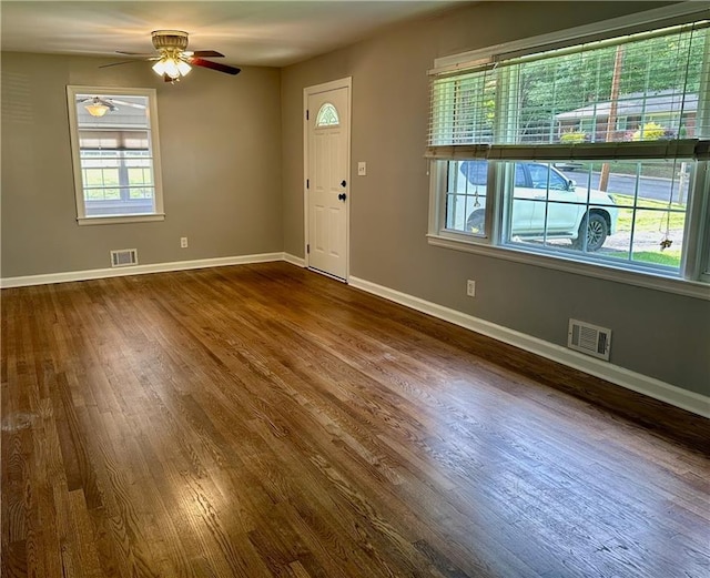 1468 Spruce Dr SE, Smyrna, GA 30080 - entrance foyer with dark wood-style flooring, baseboards, and a ceiling fan