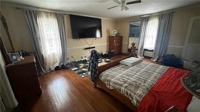 1833 Stephenson Rd, Lithonia, GA 30058 - bedroom with wood finished floors, a ceiling fan, and crown molding