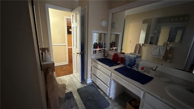 1833 Stephenson Rd, Lithonia, GA 30058 - bathroom featuring a sink and tile patterned flooring