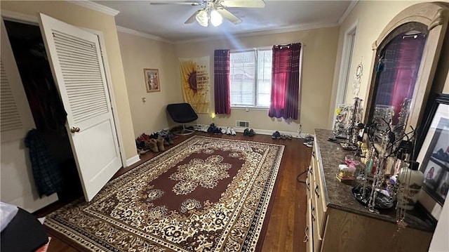 1833 Stephenson Rd, Lithonia, GA 30058 - interior space featuring wood finished floors, crown molding, baseboards, and a ceiling fan
