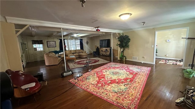 1833 Stephenson Rd, Lithonia, GA 30058 - living area featuring wood finished floors, baseboards, and ornamental molding