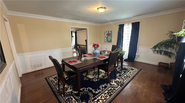1833 Stephenson Rd, Lithonia, GA 30058 - dining room featuring dark wood-style floors, wainscoting, and ornamental molding