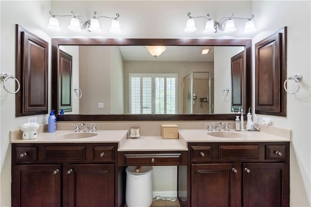 bathroom with vanity and an enclosed shower