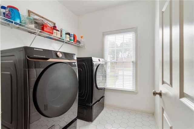 washroom featuring separate washer and dryer