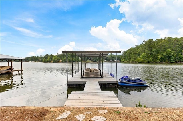 view of dock featuring a water view and boat lift