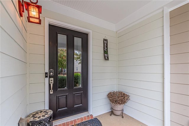 property entrance with covered porch