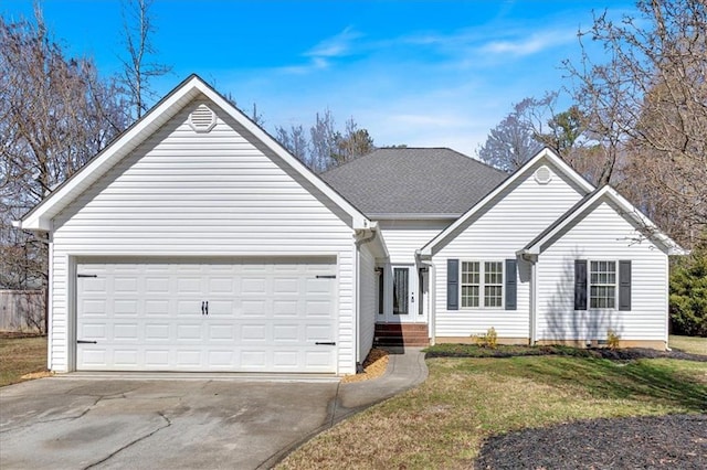 ranch-style home featuring a front lawn and a garage