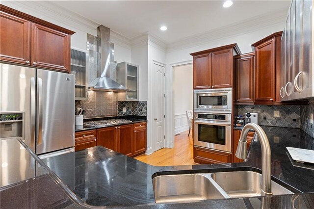 1003 Pearl Pt NE, Sandy Springs, GA 30328 - kitchen with appliances with stainless steel finishes, wall chimney exhaust hood, decorative backsplash, ornamental molding, and a sink