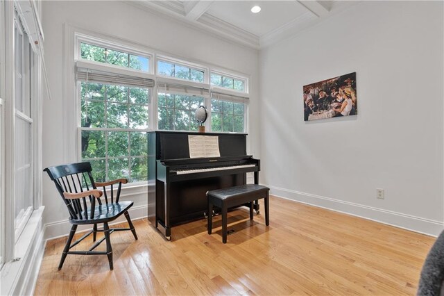 1003 Pearl Pt NE, Sandy Springs, GA 30328 - sitting room featuring baseboards, light wood-style floors, ornamental molding, beamed ceiling, and coffered ceiling