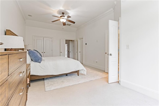 1003 Pearl Pt NE, Sandy Springs, GA 30328 - bedroom featuring ornamental molding, light carpet, baseboards, ceiling fan, and a closet