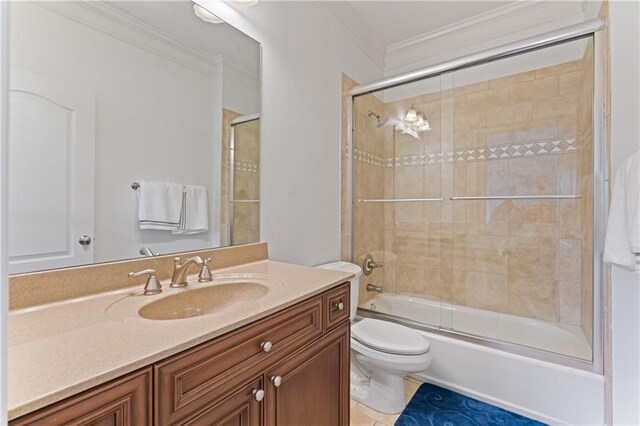 1003 Pearl Pt NE, Sandy Springs, GA 30328 - bathroom with crown molding, vanity, enclosed tub / shower combo, toilet, and tile patterned floors
