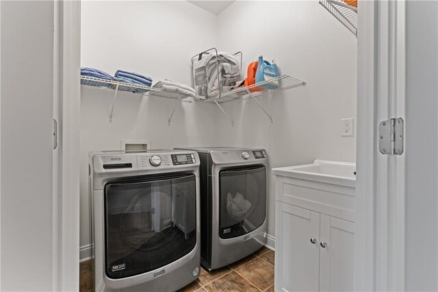 1003 Pearl Pt NE, Sandy Springs, GA 30328 - clothes washing area with independent washer and dryer and cabinet space