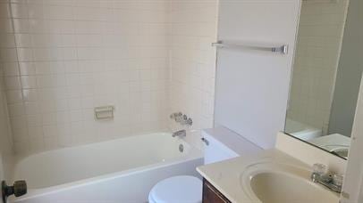 full bathroom with vanity and toilet