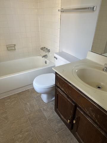 full bath with toilet, vanity, and shower / tub combination