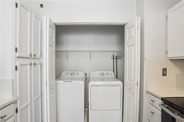 washroom featuring separate washer and dryer