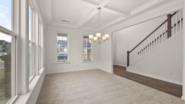 13917 Homer Ln, Covington, GA 30014 - carpeted spare room featuring coffered ceiling, an inviting chandelier, baseboards, beamed ceiling, and visible vents
