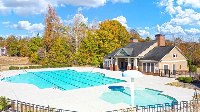 13917 Homer Ln, Covington, GA 30014 - pool with fence and a patio