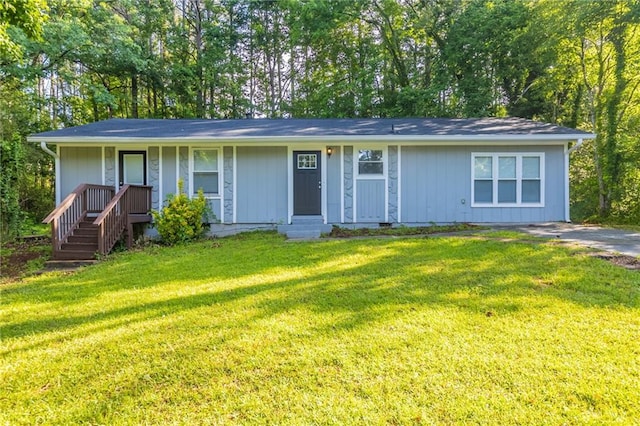 4650 Big Valley Ct, Stone Mountain, GA 30083 - ranch-style house with a front yard