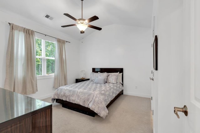 bedroom featuring carpet, ceiling fan, and vaulted ceiling