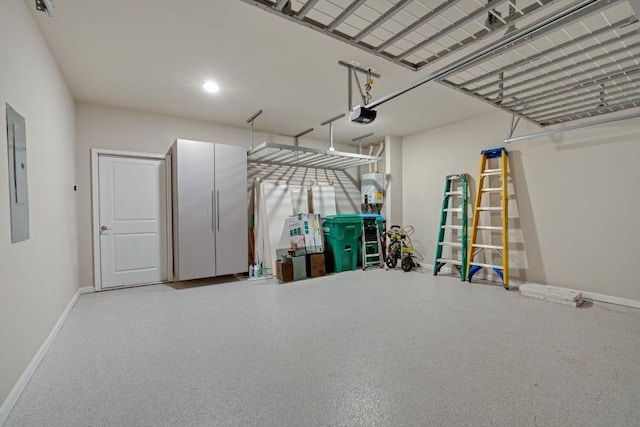 garage with electric panel and a garage door opener