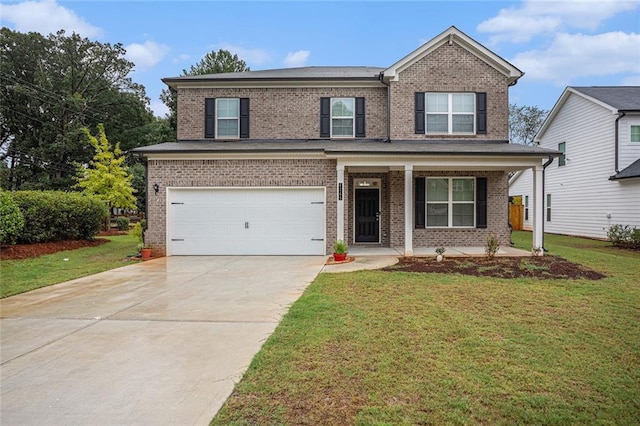 view of front of house featuring covered porch, a garage, and a front lawn