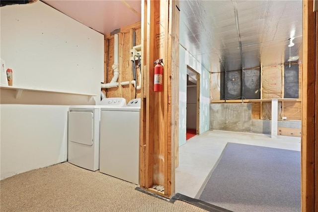 basement featuring washing machine and dryer