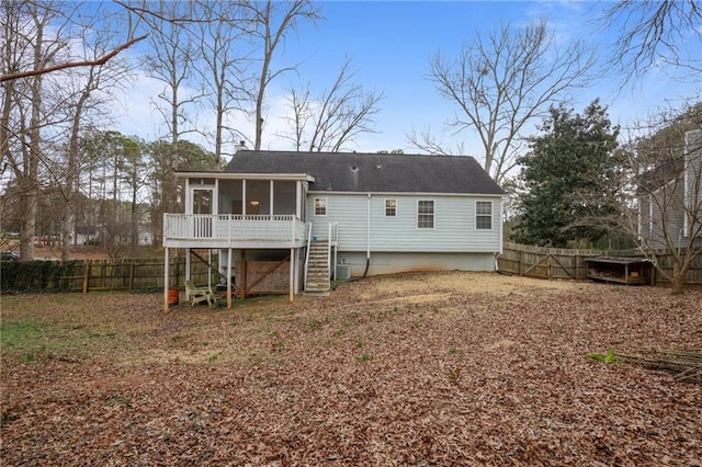 rear view of house with a sunroom