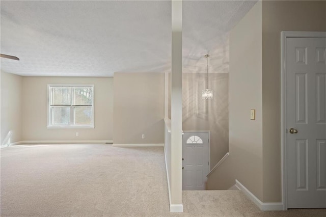 entryway with carpet floors