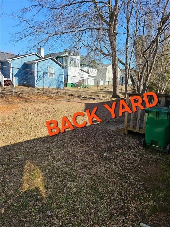 view of yard featuring fence