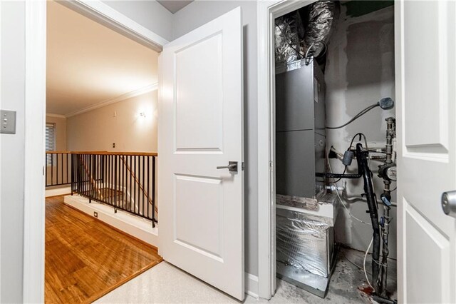 interior space with crown molding