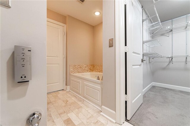 bathroom with a tub